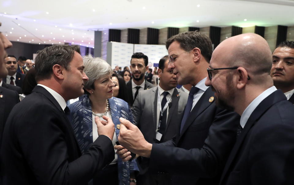 Dutch Prime Minister Mark Rutte talks to Theresa May joined by Belgium Prime Minister Charles Michel and Luxembourg’s prime minister Xavier Bettel (Reuters)