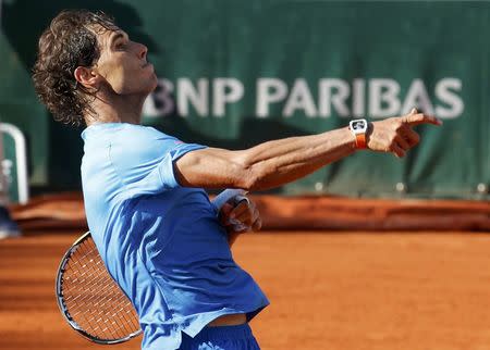 Rafael Nadal of Spain celebrates after defeating Jack Sock of the U.S. during their men's singles match during the French Open tennis tournament at the Roland Garros stadium in Paris, France, June 1, 2015. REUTERS/Jean-Paul Pelissier