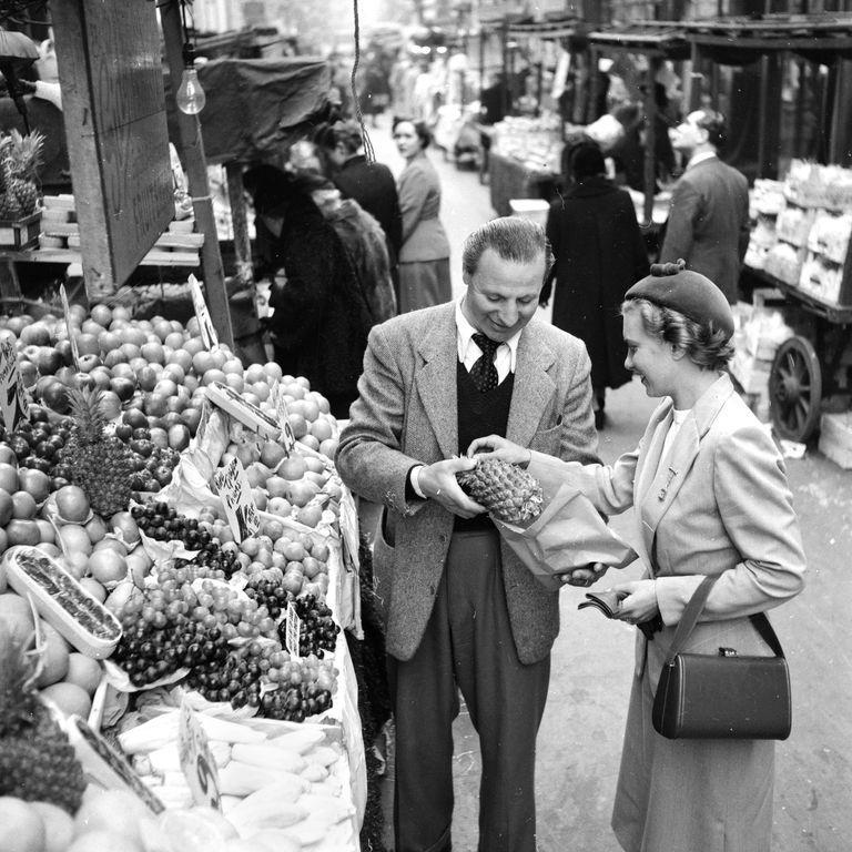 1920s: Cut up pineapple with two knives.