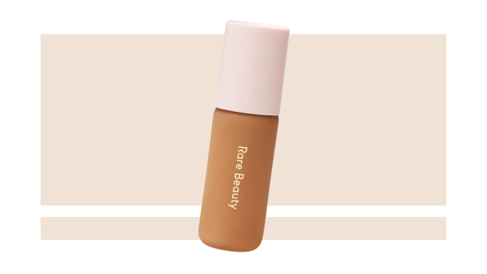 Work the Rare Beauty Positive Light Tinted Moisturizer into your skin for a "your skin but better" look.