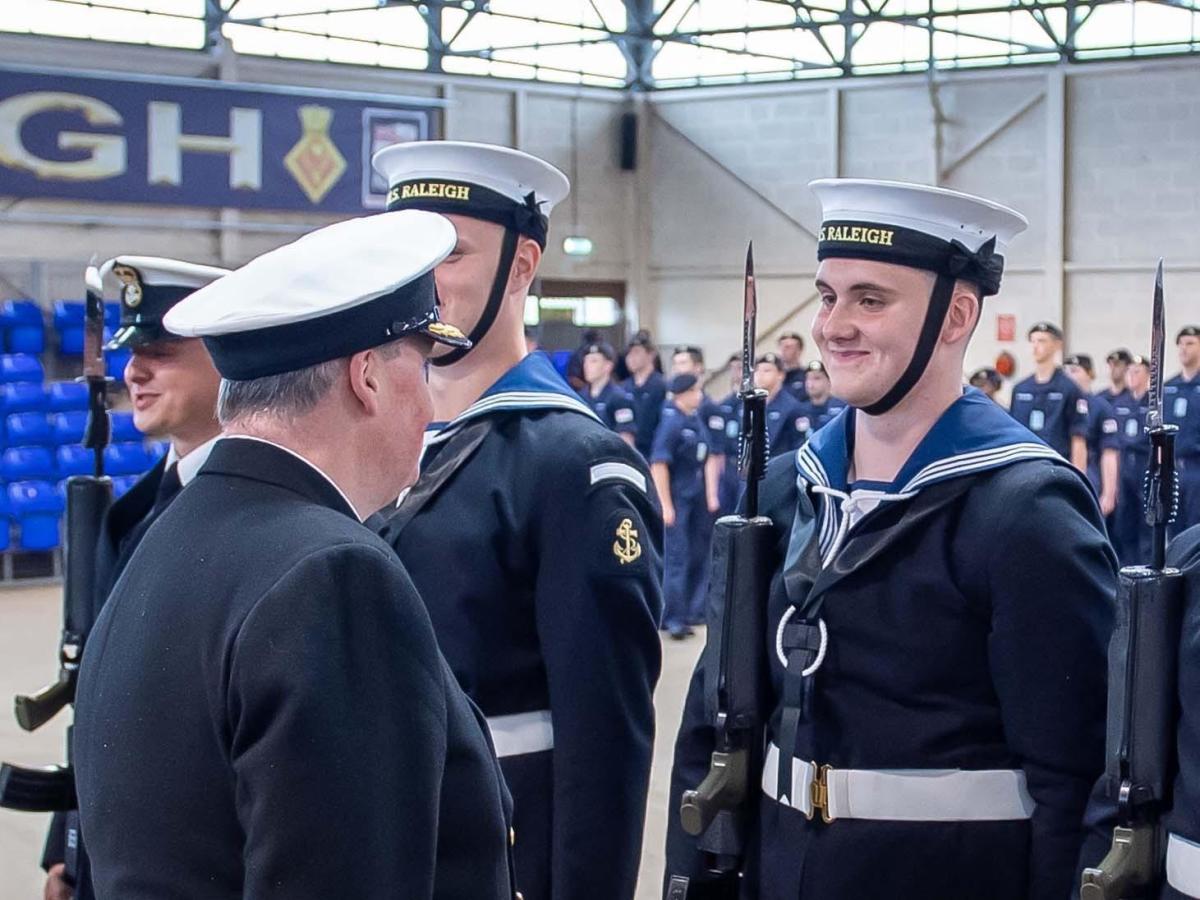 Royal Navy: Young Portsmouth sailor saluted by proud father as he