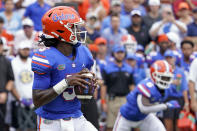 Florida quarterback Emory Jones looks for a receiver during the first half of an NCAA college football game against Alabama, Saturday, Sept. 18, 2021, in Gainesville, Fla. (AP Photo/John Raoux)