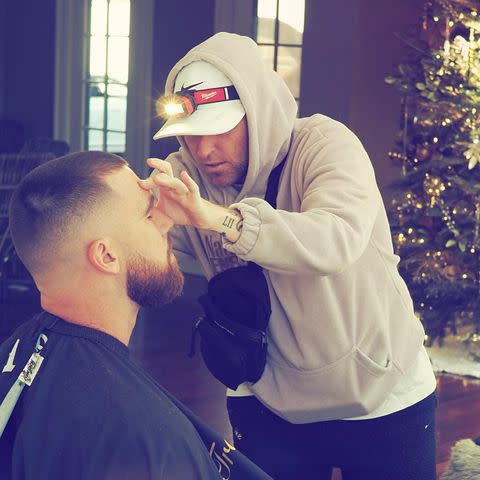 <p>Patrick Regan/Instagram</p> Travis Kelce's barber shares the photo Taylor Swift captured of his pre-game haircut on Sunday