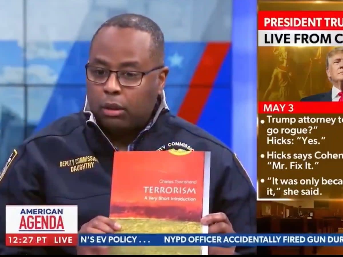 NYPD Deputy Commissioner shows terrorism book as proof of ‘outside agitators’ on Columbia’s campus (Newsmax / screengrab)