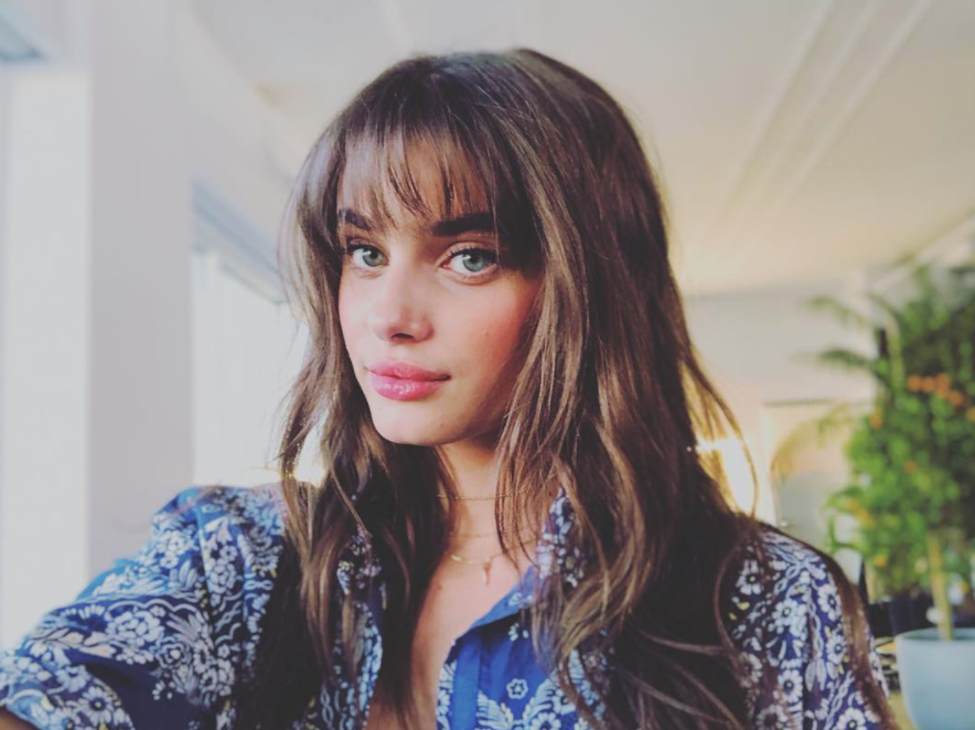 <p>The answer to whether or not you should get bangs is always yes-especially in 2018. Take a cue from Victoria's Secret Angel Taylor Hill and try a messy, choppy fringe paired with your long natural hair texture. </p>