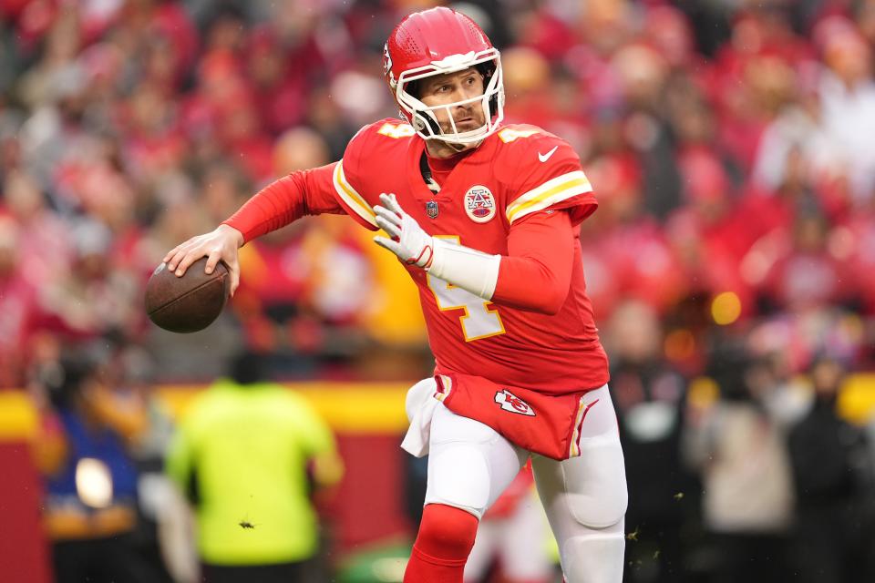 Subbing in for Patrick Mahomes, Chiefs QB Chad Henne looks to pass in the AFC divisional playoff vs. Jacksonville.