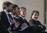 Members of Argentine soccer team San Lorenzo attend Pope Francis' Wednesday general audience in Saint Peter's square at the Vatican December 18, 2013. REUTERS/Tony Gentile