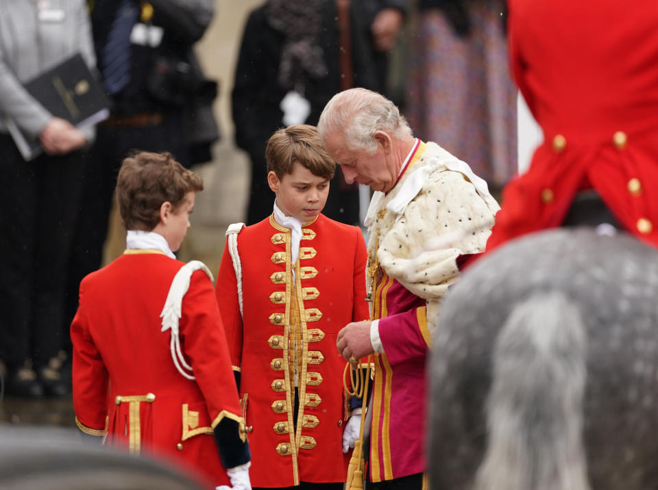 Prince George (centre) and King Charles III outside Westminster Abbey, London, ahead of the coronation of King Charles III and Queen Camilla on Saturday. Picture date: Saturday May 6, 2023. (Photo by Joe Giddens/PA Images via Getty Images)