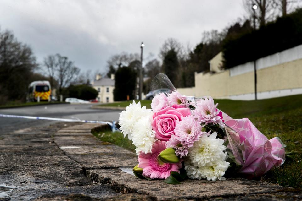 Tributes at the scene in Northern Ireland (PA)