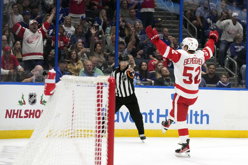 Detroit Red Wings' Jonatan Berggren (52) celebrates his goal against the Tampa Bay Lightning during the third period of an NHL hockey game Tuesday, Dec. 6, 2022, in Tampa, Fla. (AP Photo/Chris O'Meara)