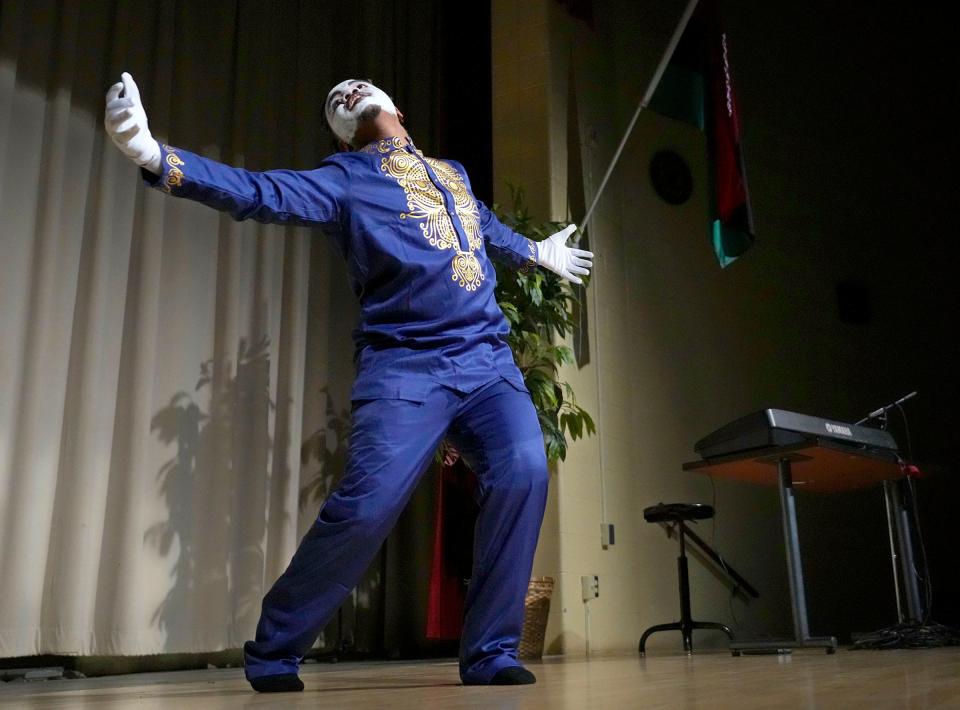 Mime dancer, Tyrone Patrick, performs “Something Has To Change”   during a Celebration Of Dr. Martin Luther King, Jr. at the Dr. Martin Luther King, Jr. Community Center on West Vilet Street in Milwaukee on Monday.  The event included speakers, theatrical and musical acts, and poetry.