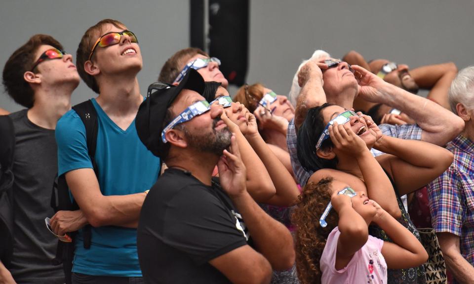 Eclipse watchers gather at UNF's Coxwell Amphitheater to watch the 2017 eclipse. UNF's Physics Department and Astronomy Club are throwing a free viewing party at the amphitheater for the April 8 eclipse.