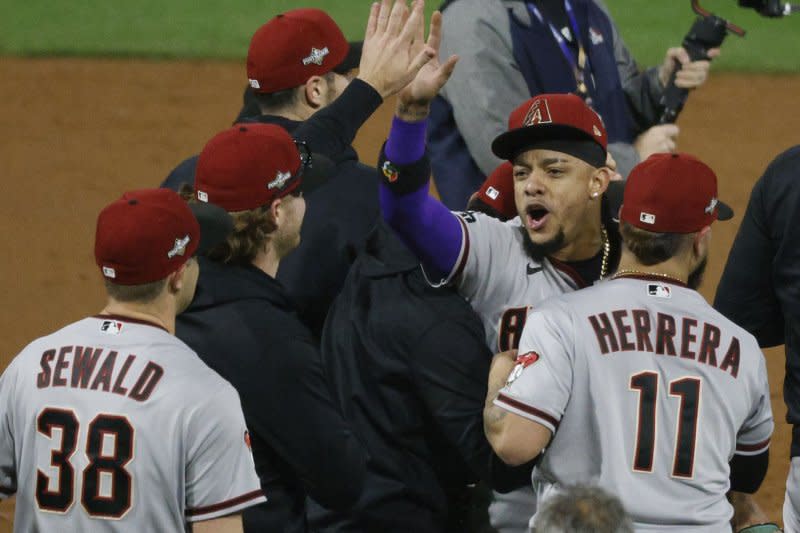 Arizona Diamondbacks second baseman Ketel Marte (C) celebrates with teammates after a win over the Philadelphia Phillies in Game 7 of the National League Championship Series on Tuesday at Citizens Bank Park in Philadelphia. Photo by Laurence Kesterson/UPI
