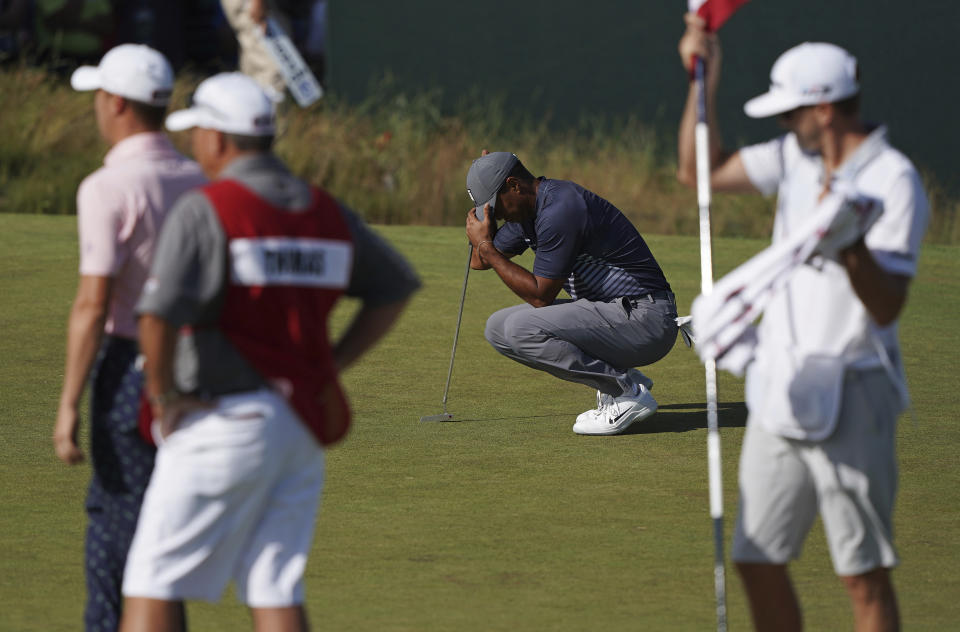 Tiger Woods’ return to U.S. Open competition started with a triple bogey, the highest single-hole score of the day. (AP)