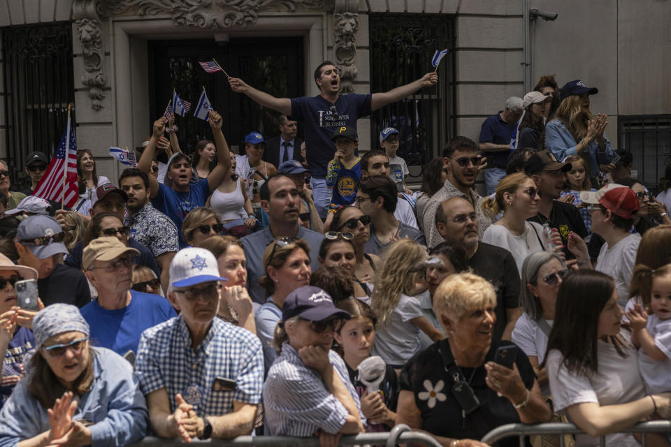 People gather for the annual Israel Day Parade on Fifth Avenue on Sunday, June 2, 2024, in New York. (AP Photo/Yuki Iwamura)