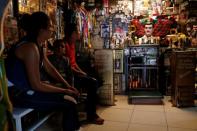 People are seen at the "Saint Jesus Malverde" chapel in Culiacan