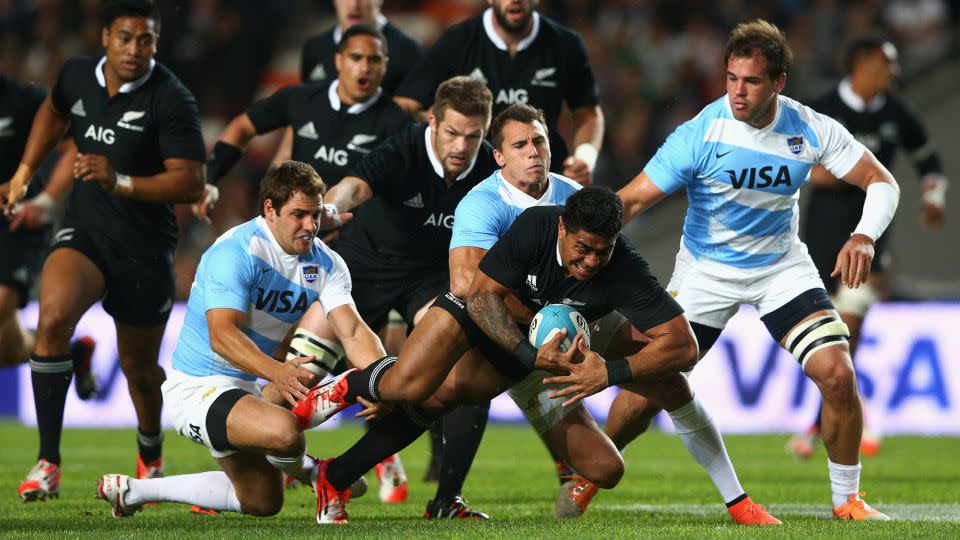 Fekitoa tries to force his way through a tackle during a Rugby Championship match between New Zealand and Argentina in 2014. - Cameron Spencer/Getty Images
