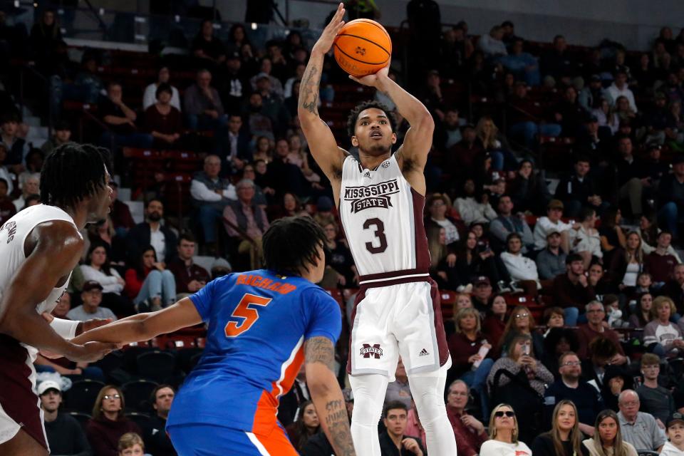 Jan 21, 2023; Starkville, Mississippi, USA; Mississippi State Bulldogs guard Shakeel Moore (3) shoots for three during the second half against the Florida Gators at Humphrey Coliseum. Mandatory Credit: Petre Thomas-USA TODAY Sports
