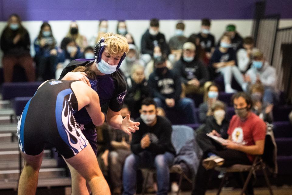 Little Falls' Brandon Harrington wrestles Dolgeville's Talan Jaquay in the 152 pound match on Thursday, Dec. 9, 2021 at Little Falls High School. Little Falls won 42-36.