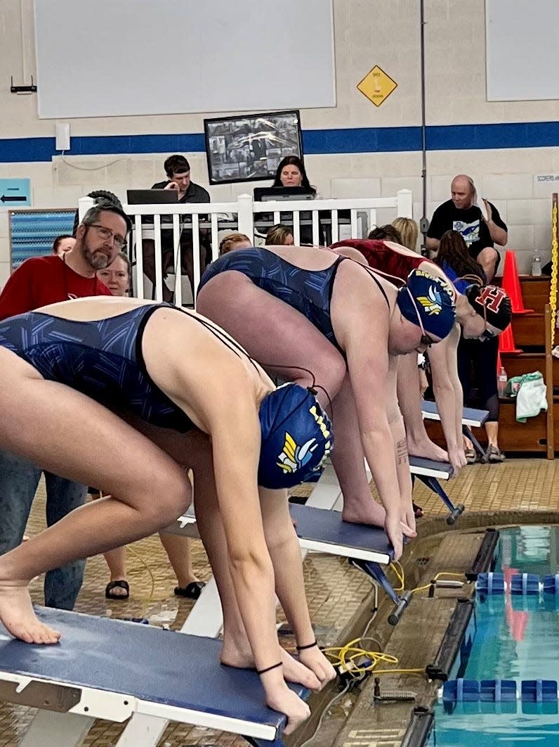 River Valley's Abigail Coyan (middle) gets ready for the 200-yard freestyle at last year's Mid Ohio Athletic Conference Swimming Championships at Ontario.