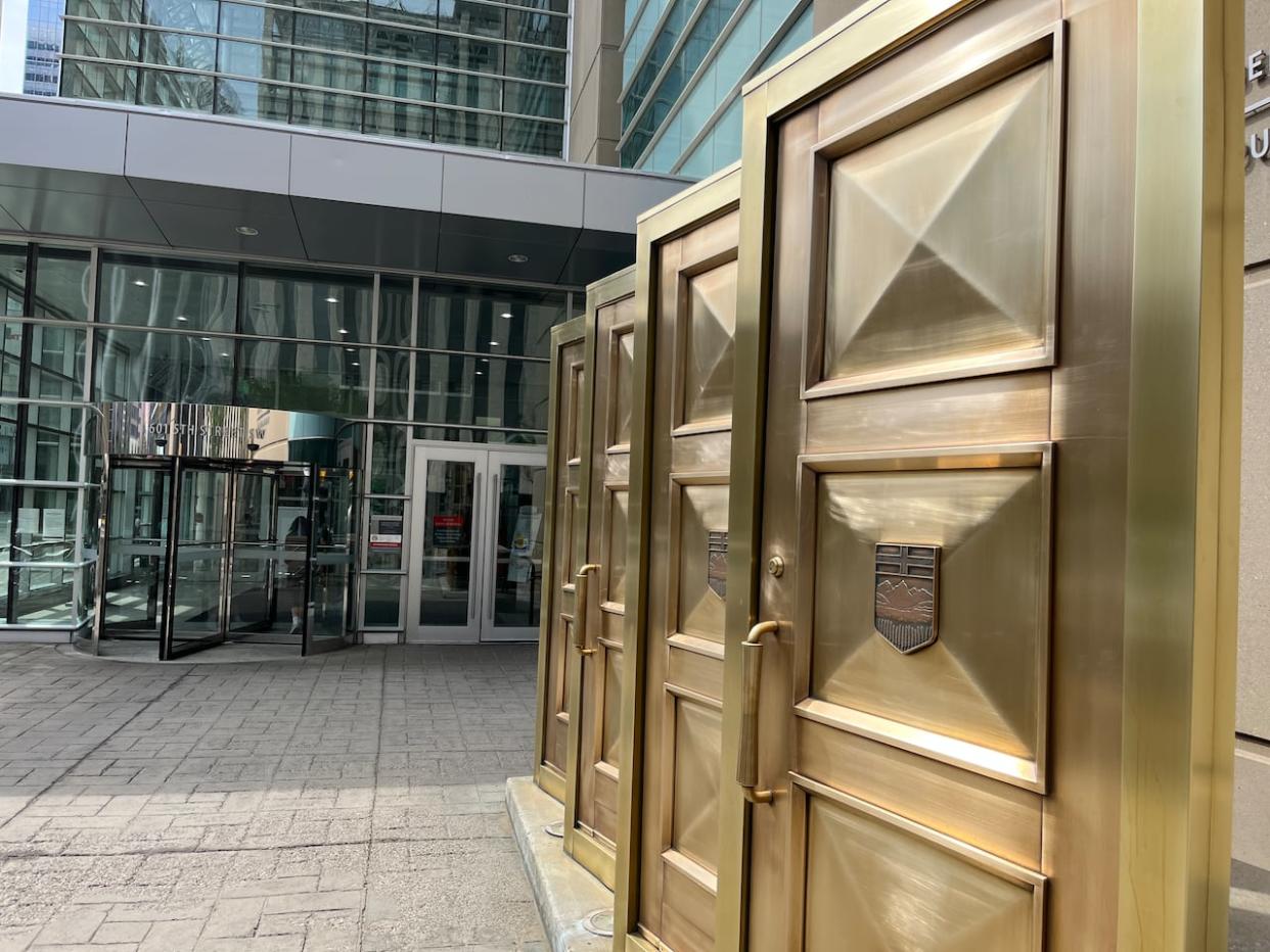 A Calgary man accused in a student loan fraud scam backed out of his planned guilty plea Wednesday and will go on trial in October instead.  (David Bell/CBC - image credit)