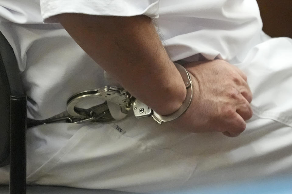 Death row inmate Taberon Honie is cuffed as he sits during the Utah Board of Pardons commutation hearing Monday, July 22, 2024, at the Utah State Correctional Facility, in Salt Lake City. (AP Photo/Rick Bowmer, Pool)