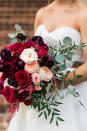 <p>"Cranberries are a popular fall food, and the color can be quite elegant as part of a wedding’s palette. Complement with orange for a very traditional palette, or with pale pink and grey to ensure that the darker shade pops!"</p>