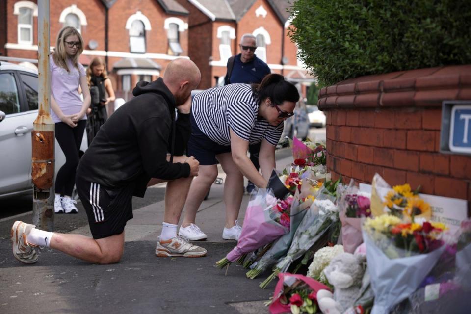 People leave tributes in Hart Street (AP)