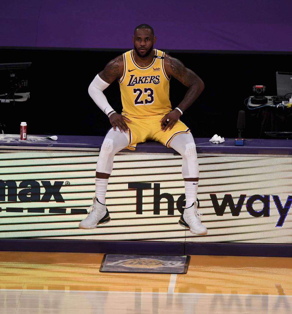 LeBron James #23 of the Los Angeles Lakers waits to enter the game against the Phoenix Suns in the second half of game six of the Western Conference First Round NBA Playoff basketball game at the Staples Center in Los Angeles on Thursday, June 3, 2021. (Keith Birmingham/The Orange County Register via AP)