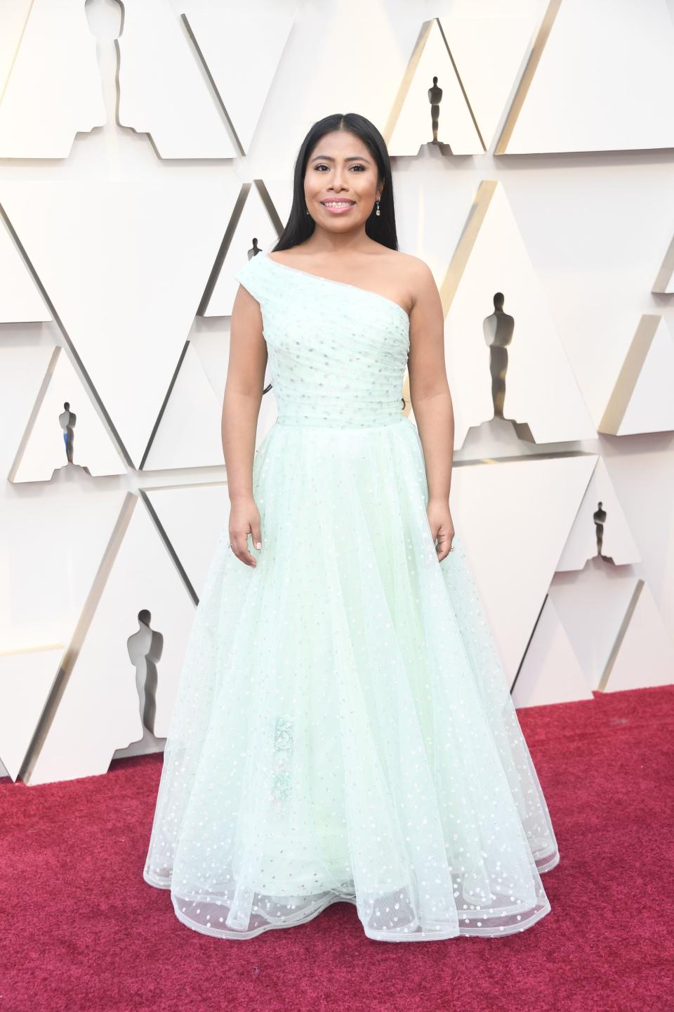 <p>The “Roma” star and first time Oscar nominee opted for a mint one-shoulder gown for her first time at the Academy Awards. <em>[Photo: Getty]</em> </p>