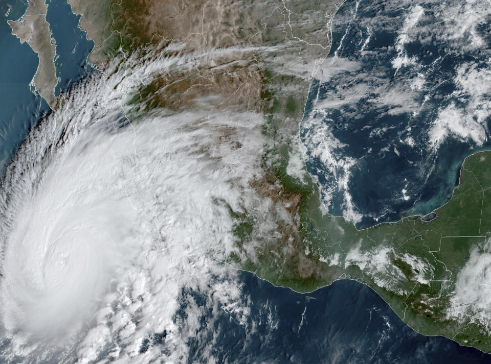 This satellite image provided by NOAA on Thursday, Oct. 19, 2023, shows Hurricane Storm Norma approaching the southern tip of the Baja California peninsula on Mexico's Pacific coast. (NOAA via AP)