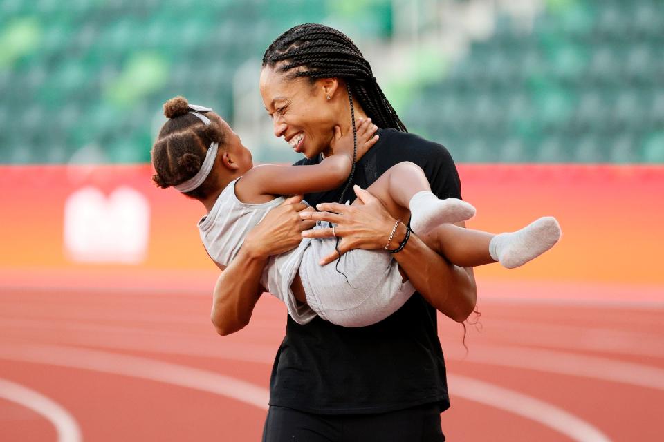 Allyson Felix celebrates with her daughter Camryn after day nine of the 2020 U.S. Olympic Track & Field Team Trials at Hayward Field on June 26, 2021 in Eugene, Oregon.