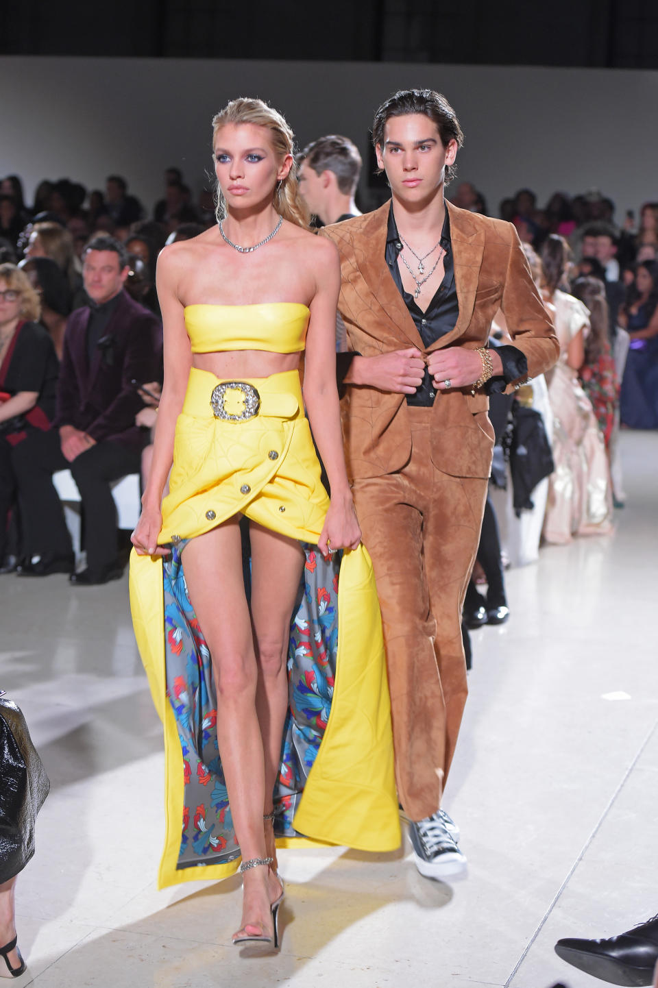 Stella Maxwell and Paris Brosnan walk the runway at the Spring Summer 2020 Fashion For Relief show during London Fashion Week [Photo: Getty Images]