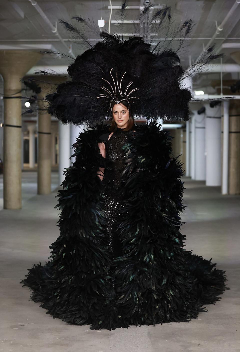 A model wears a statement piece from Christian Cowan's Fall/Winter 2023 show.