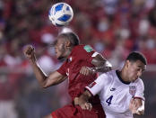 Panama's Alfredo Stephens, left, and United States´ Tyler Adams head the ball during a qualifying soccer match for the FIFA World Cup Qatar 2022 at Rommel Fernandez stadium, in Panama city, Panama, Sunday, Oct. 10, 2021. (AP Photo/Arnulfo Franco)