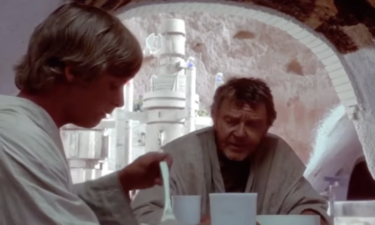 Luke and Owen Lars in the dining room of the Lars Homestead Courtyard, which was filmed at the Hotel Sidi Idriss in Matmata, Tunisia. (Photo: Lucasfilm/YouTube)