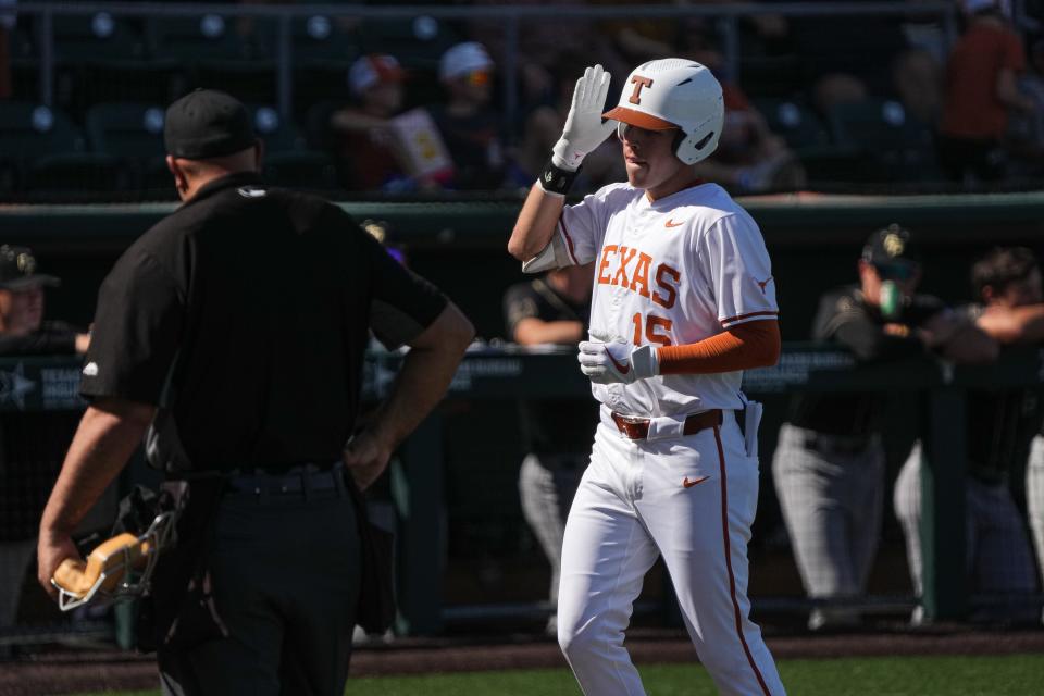 Texas Longhorns utility player Peyton Powell (15) celebrates a home run during the game against Cal Poly at UFCU Disch–Falk Field on Sunday, Feb. 24, 2024 in Austin.