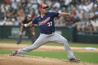 Minnesota Twins starter Dylan Bundy delivers a pitch during the first inning of a baseball game against the Chicago White Sox, Monday, July 4, 2022, in Chicago. (AP Photo/Paul Beaty)