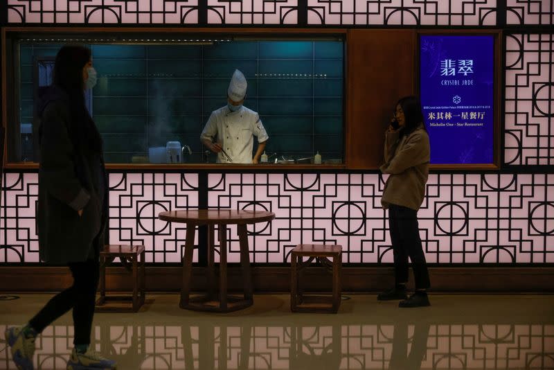 A chef prepares food in a restaurant in a department store following an outbreak of the coronavirus disease (COVID-19) in Beijing