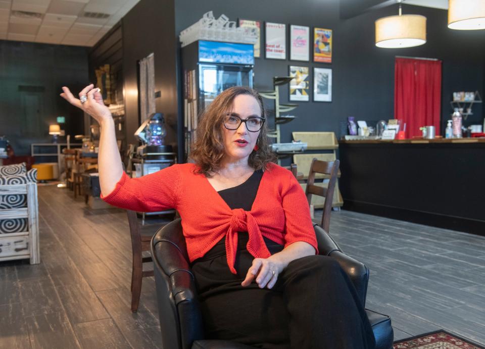 Stephanie Jones, the Mrs. Jones Cold Brew Coffee Bar owner on Nine Mile Road, describes her inspiration for opening her new stand-alone shop on Thursday, Sept. 21, 2023. The new coffee shop and bookstore will open to the public on Sept. 28, 2023.