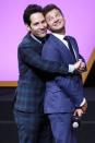 Paul Rudd playfully cuddles up to costar Jeremy Renner at the <em>Avengers: Endgame</em> premiere on Thursday in Shanghai. 