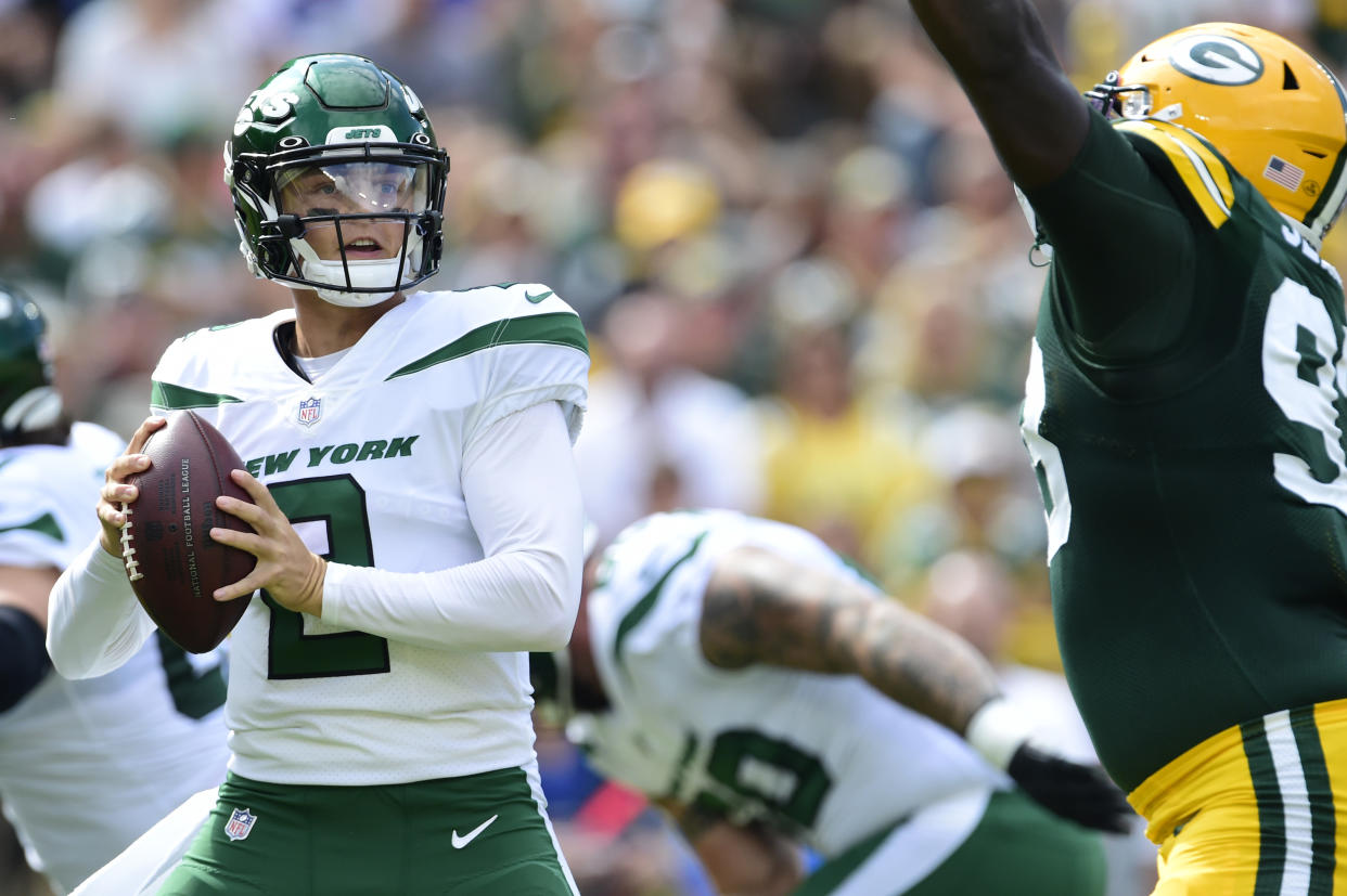 GREEN BAY, WISCONSIN - AUGUST 21: Zach Wilson #2 of the New York Jets looks to throw a pass against the Green Bay Packers in the first half of a preseason game at Lambeau Field on August 21, 2021 in Green Bay, Wisconsin. (Photo by Patrick McDermott/Getty Images)