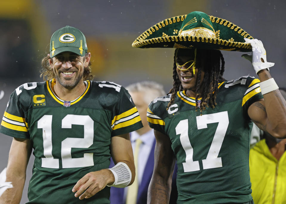 Green Bay Packers quarterback Aaron Rodgers (12) and receiver Davante Adams (17) had a lot of fun in Monday night's win. (AP Photo/Jeffrey Phelps)