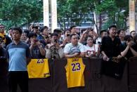 NBA fans wait outside a Ritz-Carlton hotel in Shanghai