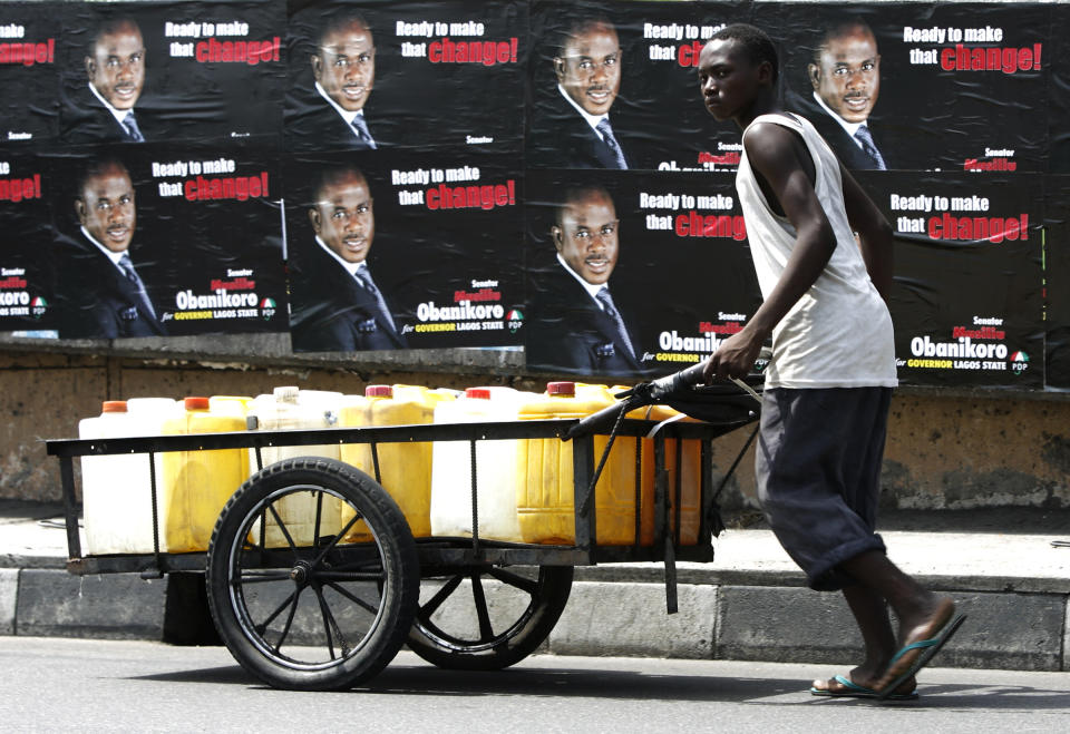 Water vendors are ubiquitous in Lagos and have been called a "saving grace" by water-strapped residents. But where these vendors get their water from is sometimes suspect. (Photo: Finbarr O'Reilly/Reuters)