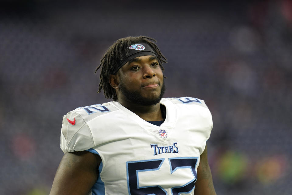 FILE - Tennessee Titans offensive lineman Aaron Brewer (62) warmups before an NFL football game against the Houston Texans, Sunday, Jan. 9, 2022, in Houston. (AP Photo/Matt Patterson, File)