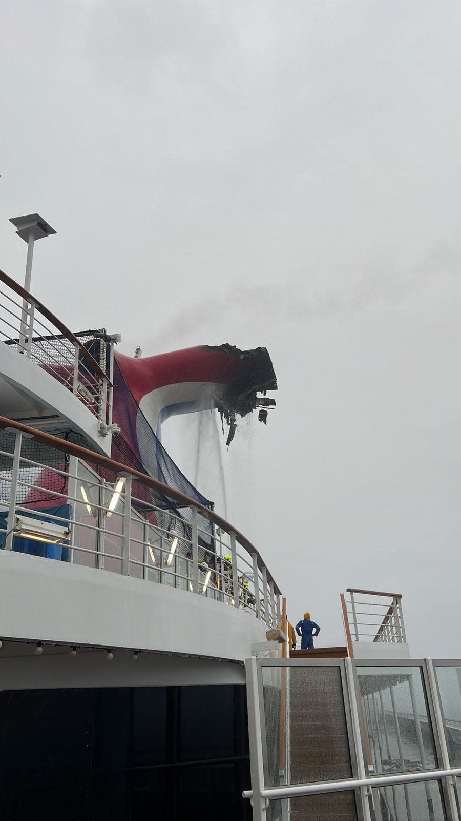 This photo shows the damage to the exhaust funnel on thre Carnival Freedom cruise ship caused by a fire on Saturday.