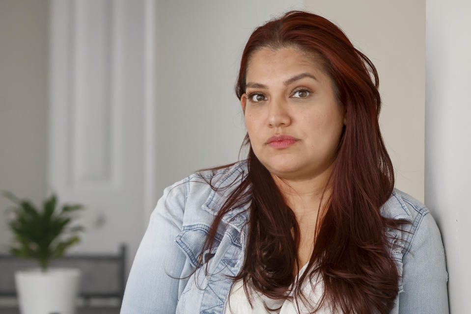 Victoria Cornejo Barrera, former head custodian for a high school in Columbia, South Carolina poses at her home in Columbia, S.C., Monday, June 10, 2024. The Pregnant Workers Fairness Act entitled her to the types accommodations she had been seeking when she was pregnant. (AP Photo/Nell Redmond)