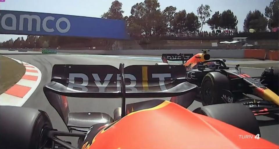 Max Verstappen passes Sergio Perez at the Spain Grand Prix.