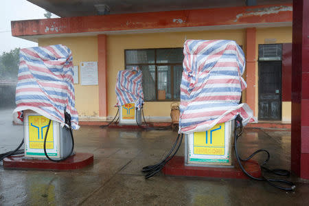 Gas pumps are covered in a gas station as the Doksuri storm hits Ha Tinh province, Vietnam September 15, 2017. REUTERS/Kham